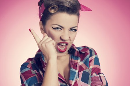 Angry sexy retro woman shaking her finger