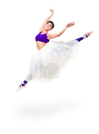 Full length of young ballerina jumping