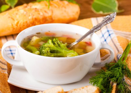 Vegetable broccoli soup and carrots, bread with fennel