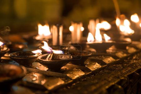 Ritual candles in Shwedagon Pagoda