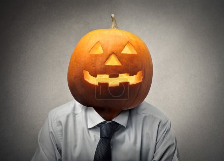 Businessman with a pumpkin head