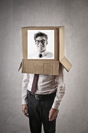 Box on a businessman's head