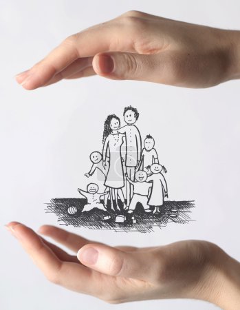 Hands protecting a family