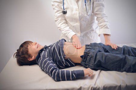 doctor visiting a boy