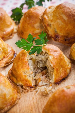 Baked bread stuffed with cabbage and mushrooms