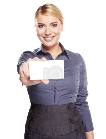 A beautiful woman holds out a business or credit card