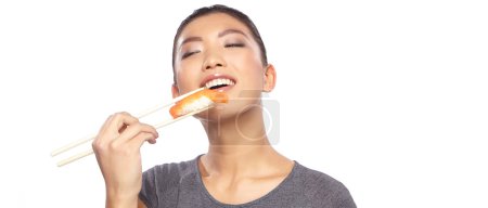 Japanese woman enjoy sushi