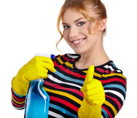 Woman as a cleaning maid holding liquids and showing OK sign