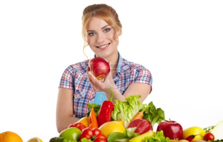 Woman with lot of fruits and vegetables