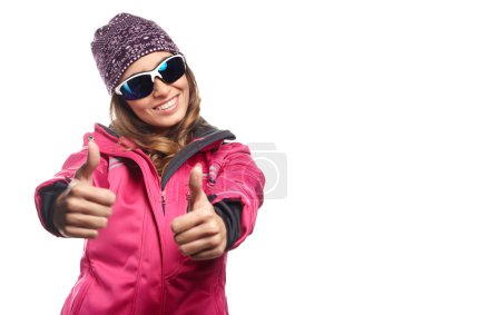 Woman in pink jacket and goggles