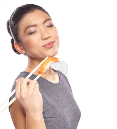 Japanese woman enjoy sushi