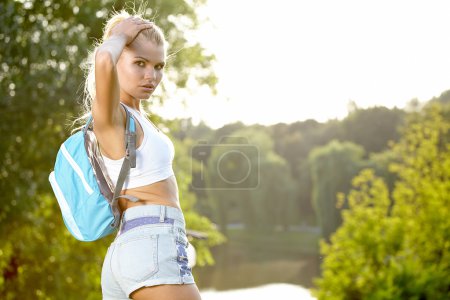 beautiful girl hiking outdoors leading a healthy lifestyle