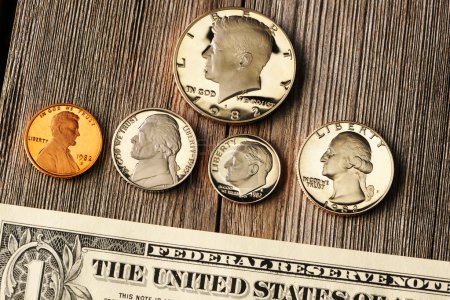 US money over wooden background