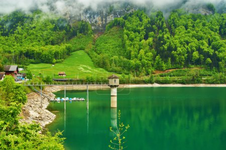 Beautiful emerald mountain lake in Switzerland