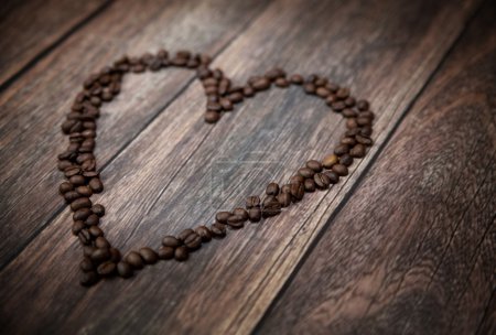 Picture presenting fragrant heart made of coffee beans