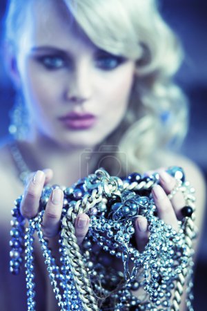 Amazing blonde woman with jewelary
