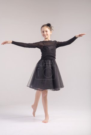 Young girl in the dance pose