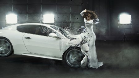 Alluring fashionable lady in the middle of car crash
