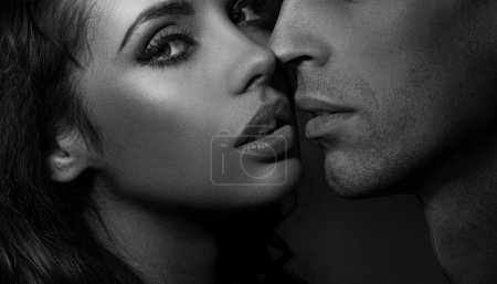 Close up black and white portrait of a loving couple