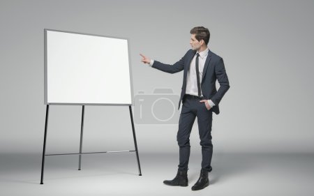 Young businessman making a lecture about business