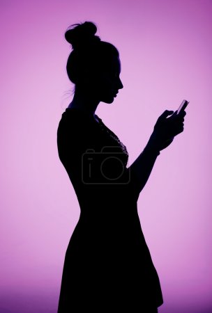 Young lady texting to her boyfriend
