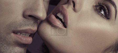 Young couple and sensual lips of lady