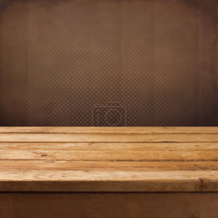 Vintage retro background with wooden table and wallpaper