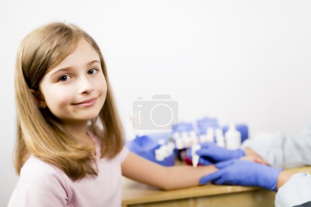 Allergy - skin prick tests, cute girl in a laboratory