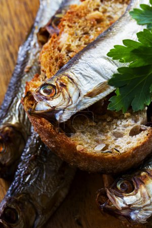 Fish, Spanish tapas - sprat on baked bread