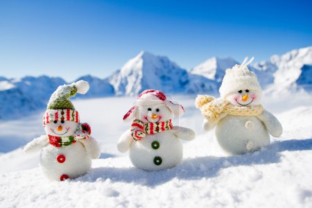 Winter, snow, sun and fun - happy snowman friends