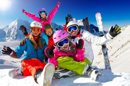 Ski, snow and winter fun - happy family ski team