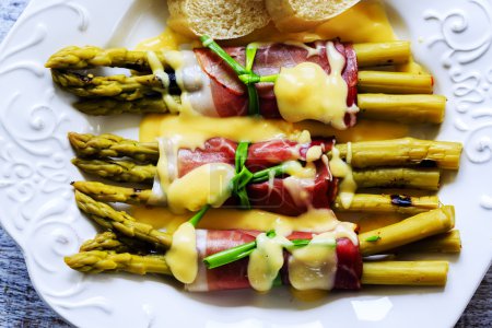 Asparagus - Grilled young asparagus wrapped in prosciutto meat
