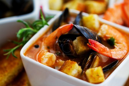 Fish soup - traditional Mediterranean fish soup with mussels and shrimp