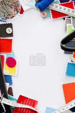 Design, fashion - A fabric samples over white background, copy space