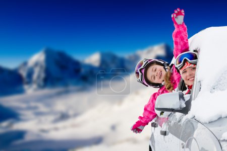 Winter, ski - happy family on the road for ski holidays