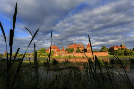 Malbork Castle in Poland, view to Malbork Castle across lake