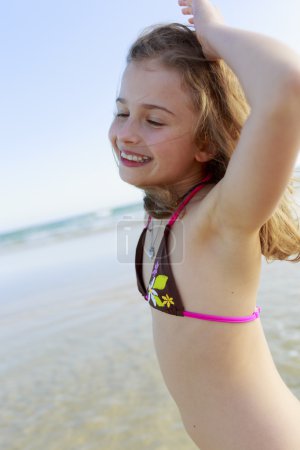 Summer joy - young girl enjoying summer