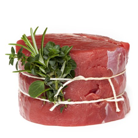 Raw Beef Steak with Herbs Isolated
