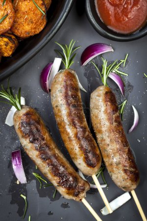 Sausages with Rosemary and Sweet Potato Fries