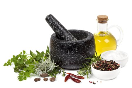 Mortar and Pestle with Herbs and Spices Isolated