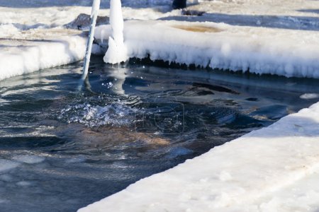 Bathing in an ice-hole