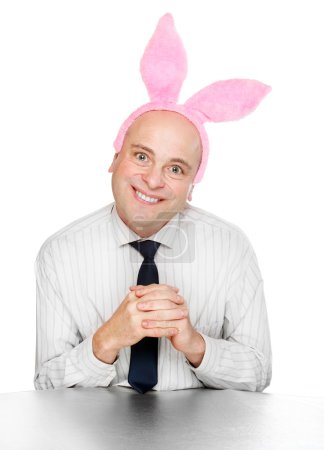Funny picture of an successful manager with rabbit ears