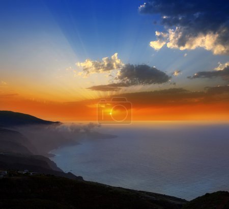 La Palma muntains sunset with orange sun