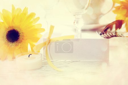 Decorated table setting and blank message card