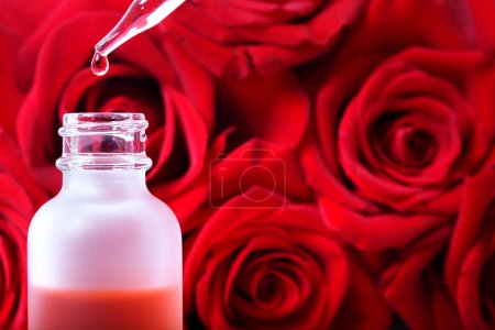 Dropper bottle with red roses