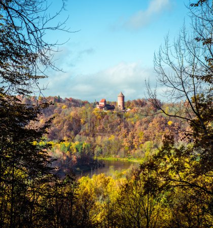 Turaida Castle over picturesque autumn landscape