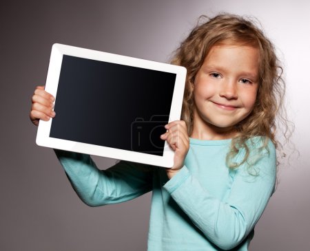 Happy girl with tablet computer
