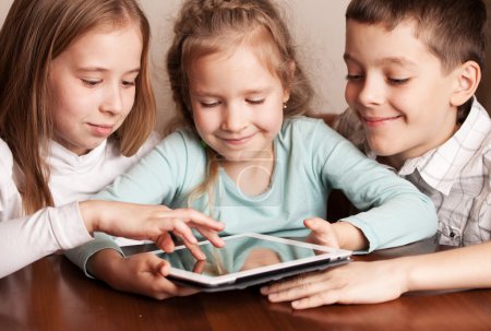 Children playing on tablet