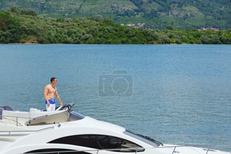 Young man on yacht