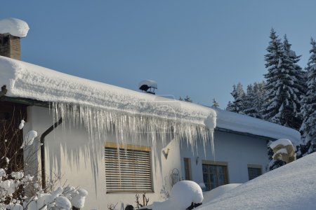 Alpine hut in winter